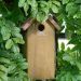 Vogelhuisje-koolmees-met-koperen-dak-nest-vogel-tuin